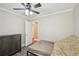 Bedroom featuring ceiling fan and adjoining room at 4035 Woodbridge Ct, Powder Springs, GA 30127