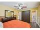 Cozy bedroom featuring ceiling fan, bed, and lots of space at 4035 Woodbridge Ct, Powder Springs, GA 30127
