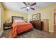 Bedroom featuring ceiling fan, bed and lots of space at 4035 Woodbridge Ct, Powder Springs, GA 30127