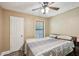 Bedroom featuring a ceiling fan and comfy bed at 4035 Woodbridge Ct, Powder Springs, GA 30127