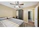 Bedroom includes a bed, ceiling fan, closet, and hardwood floors at 4035 Woodbridge Ct, Powder Springs, GA 30127