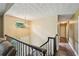 The hallway features hardwood floors, neutral paint, and a decorative ceiling at 4035 Woodbridge Ct, Powder Springs, GA 30127