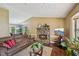 Cozy living room featuring a stone fireplace and hardwood floors at 4035 Woodbridge Ct, Powder Springs, GA 30127