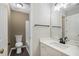 Cozy bathroom with modern fixtures, granite counters, and tile flooring at 463 The Gables Dr, Mcdonough, GA 30253