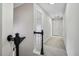 Light and airy hallway featuring neutral paint and carpet flooring at 463 The Gables Dr, Mcdonough, GA 30253