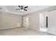 Spacious main bedroom features a tray ceiling, and exits to the main bathroom at 463 The Gables Dr, Mcdonough, GA 30253