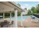 Community pool offers a relaxing spot with seating and covered area at 463 The Gables Dr, Mcdonough, GA 30253
