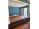Comfortable living room with stylish wainscoting, and modern floors at 1234 Carolyn St, Marietta, GA 30062