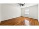 Spacious bedroom boasts gleaming hardwood floors, ample natural light and ceiling fan at 1622 Executive Park Ne Ln, Atlanta, GA 30329