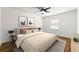 This cozy bedroom is furnished with a queen size bed and has nice decor, plus a ceiling fan at 1622 Executive Park Ne Ln, Atlanta, GA 30329