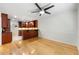 Open space featuring hardwood floors connecting to the modern kitchen with stainless steel appliances at 1622 Executive Park Ne Ln, Atlanta, GA 30329