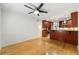 Open space featuring hardwood floors connecting to the modern kitchen with stainless steel appliances at 1622 Executive Park Ne Ln, Atlanta, GA 30329