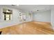 Bright living room with sliding doors leading to an outdoor space, wood floors and modern lighting at 1622 Executive Park Ne Ln, Atlanta, GA 30329
