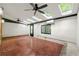 Bright sunroom with brick accent wall, multiple skylights, and unique tiled floors at 1622 Executive Park Ne Ln, Atlanta, GA 30329