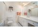 Well-lit bathroom featuring a white vanity, decorative towels, and a shower-tub combination at 2855 Cedar Canyon Ct, Atlanta, GA 30345