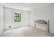 Airy bedroom with plush carpeting and ample natural light streaming through the window, creating a serene atmosphere at 2855 Cedar Canyon Ct, Atlanta, GA 30345