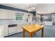 Bright kitchen with white appliances, ample counter space, and a view of the breakfast nook at 2855 Cedar Canyon Ct, Atlanta, GA 30345