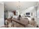 Open floor plan with dining room and view to living room and stairs at 607 Tall Timbers, Woodstock, GA 30188