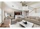 Open concept floor plan with sofa and chairs facing the staircase at 607 Tall Timbers, Woodstock, GA 30188