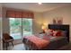 Cozy bedroom with a large window, stylish décor, and a comfortable bed at 1406 Lucan Nw Ln # Wc221, Lawrenceville, GA 30043