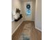 Inviting entryway with a stylish rug, modern decor, and a well-lit doorway creating a warm welcome at 1406 Lucan Nw Ln # Wc221, Lawrenceville, GA 30043