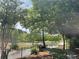 Scenic pond view with a wrought iron fence and lush greenery at 1406 Lucan Nw Ln # Wc221, Lawrenceville, GA 30043