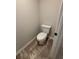 Tidy powder room with a new toilet and tile flooring at 1406 Lucan Nw Ln # Wc221, Lawrenceville, GA 30043