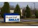 A clear view of a Sugarloaf Mills sign by the roadside at 1406 Lucan Nw Ln # Wc221, Lawrenceville, GA 30043
