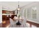Charming breakfast area with light-filled windows is adjacent to the kitchen at 2513 Friar Tuck Se Ln # 1, Atlanta, GA 30339