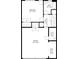 Floor plan featuring bedroom, bath, hall, utility, storage, and a spacious garage at 2513 Friar Tuck Se Ln # 1, Atlanta, GA 30339