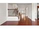 Welcoming entrance with hardwood floors and staircase at 2513 Friar Tuck Se Ln # 1, Atlanta, GA 30339
