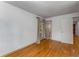 This bedroom has hardwood floors, and a glass door leading to the outside at 2517 Birchwood Ne Dr, Atlanta, GA 30305