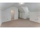 Bonus room featuring carpet, a window, and an attached bathroom at 2517 Birchwood Ne Dr, Atlanta, GA 30305