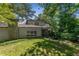 Charming home exterior featuring a manicured lawn, lush landscaping, and a welcoming facade for a picturesque curb appeal at 2517 Birchwood Ne Dr, Atlanta, GA 30305