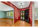 Spacious foyer with hardwood floors, decorative wallpaper, and views into adjoining rooms at 2517 Birchwood Ne Dr, Atlanta, GA 30305