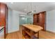 Kitchen with butcher block island, dark wood cabinets and stainless appliances, opens to dining room at 2517 Birchwood Ne Dr, Atlanta, GA 30305