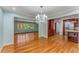 Open-concept living space featuring hardwood floors and elegant architectural details at 2517 Birchwood Ne Dr, Atlanta, GA 30305