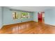 Bright living room with hardwood floors, large windows, and a fresh, airy feel at 2517 Birchwood Ne Dr, Atlanta, GA 30305