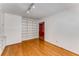 A living room with built-in shelving and hardwood floors, a bright and open space at 2517 Birchwood Ne Dr, Atlanta, GA 30305