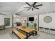 Outdoor kitchen with a large island, ceiling fans, TV, and a grill at 2535 Hampton Trl, Cumming, GA 30041
