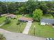 Aerial view of the home with a well-maintained lawn and mature trees at 3779 Elkridge Dr, Decatur, GA 30032