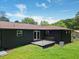 Backyard featuring a black exterior, fenced yard, and patio at 3779 Elkridge Dr, Decatur, GA 30032