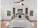 Calm bedroom featuring hardwood floors, neutral colors, large windows, and decorative wall accents at 3779 Elkridge Dr, Decatur, GA 30032