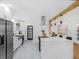 Bright, modern kitchen showcasing a spacious island with stone countertop and stainless steel appliances at 3779 Elkridge Dr, Decatur, GA 30032
