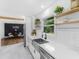 Modern kitchen boasting stainless steel appliances, open shelving, and a view into the dining area at 3779 Elkridge Dr, Decatur, GA 30032