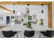 Modern kitchen featuring a large quartz island, stainless steel appliances, and stylish pendant lighting at 3779 Elkridge Dr, Decatur, GA 30032