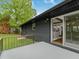 Back patio features a black exterior and outdoor living space with a view to the kitchen at 3779 Elkridge Dr, Decatur, GA 30032