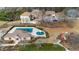 Aerial view of the neighborhood pool and playground with single Gathering homes in a planned community at 2430 Redbud Meadow Ln, Douglasville, GA 30135