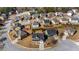 An aerial view showcases the homes and well-maintained landscaping in a quiet, residential neighborhood at 2430 Redbud Meadow Ln, Douglasville, GA 30135