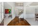 Bright foyer featuring high ceilings, art, and gleaming floors that flow into the living spaces at 2430 Redbud Meadow Ln, Douglasville, GA 30135